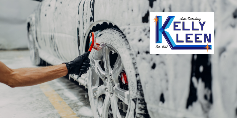 a professional washing a car